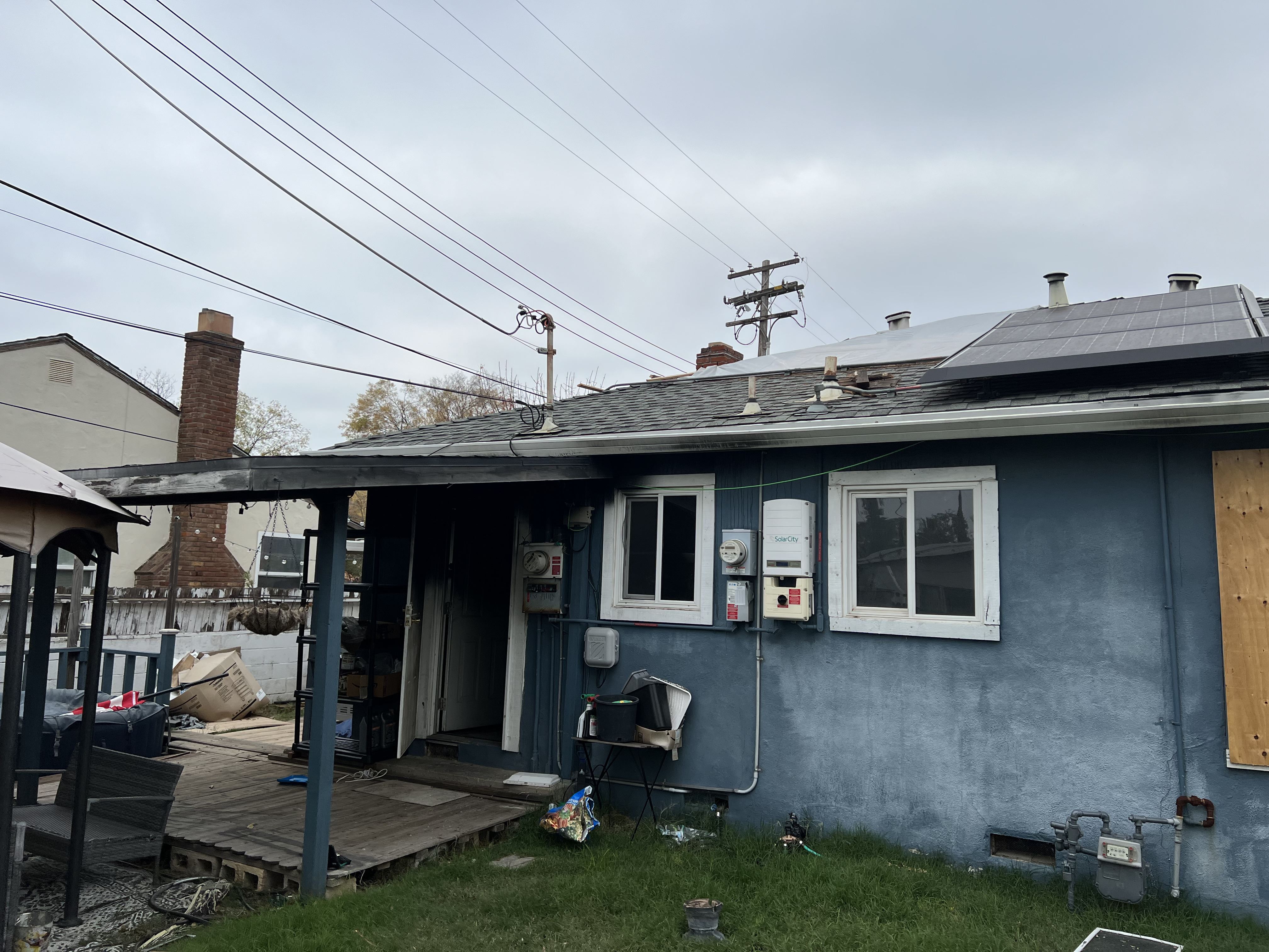 Exterior Rear, Roof Damage From Fire Department Photo