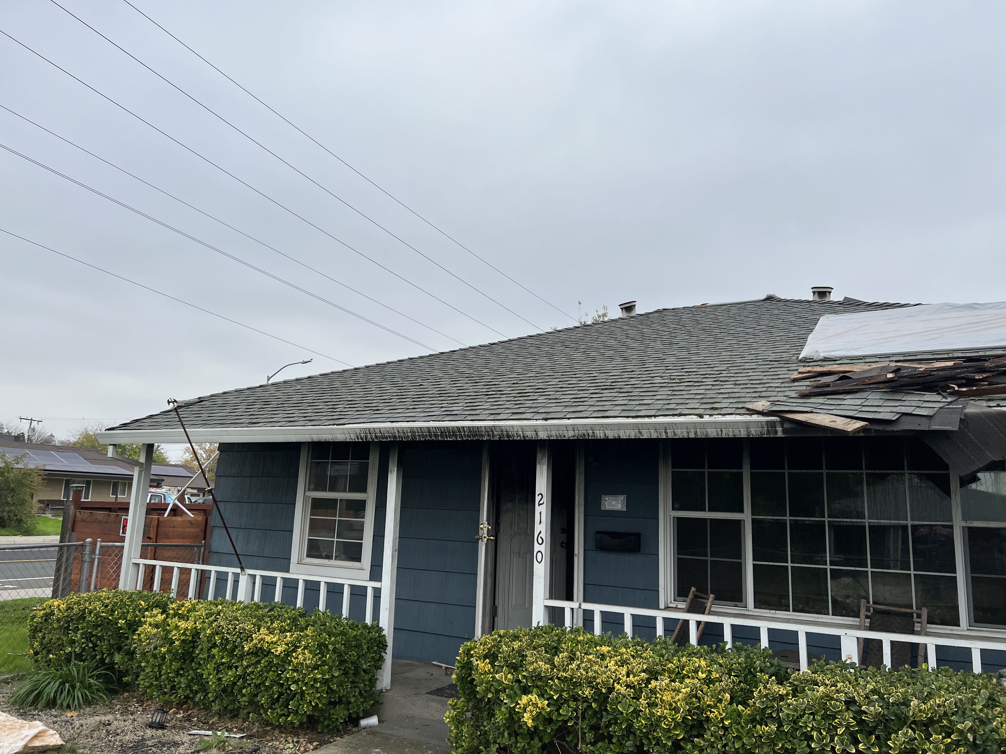 Exterior Front, Fire Damage on Siding, Fire Damage on Roof Photo