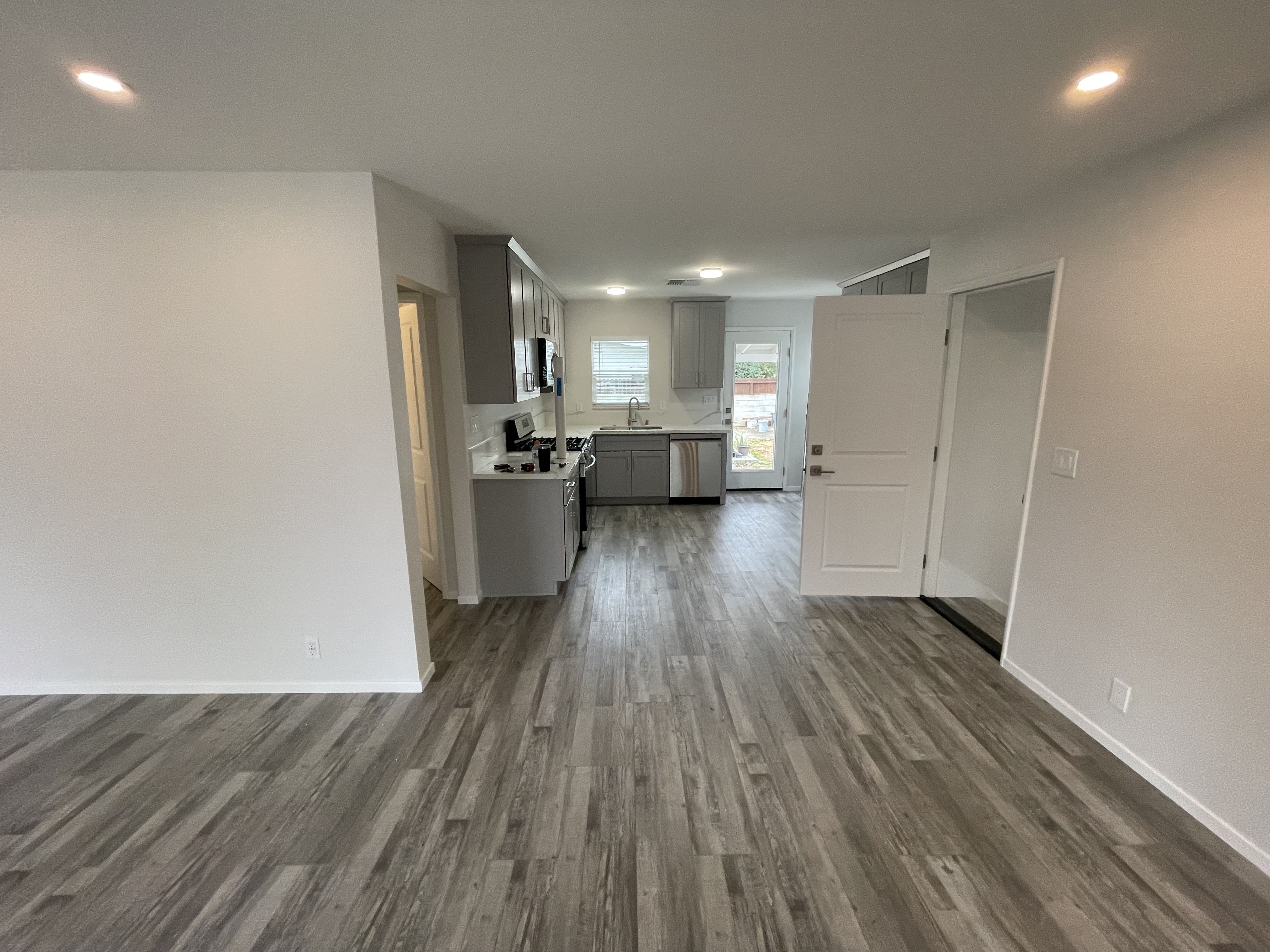 After Interior, Repaired Walls, Floors, Kitchen, Electrical, Doors, etc. Photo