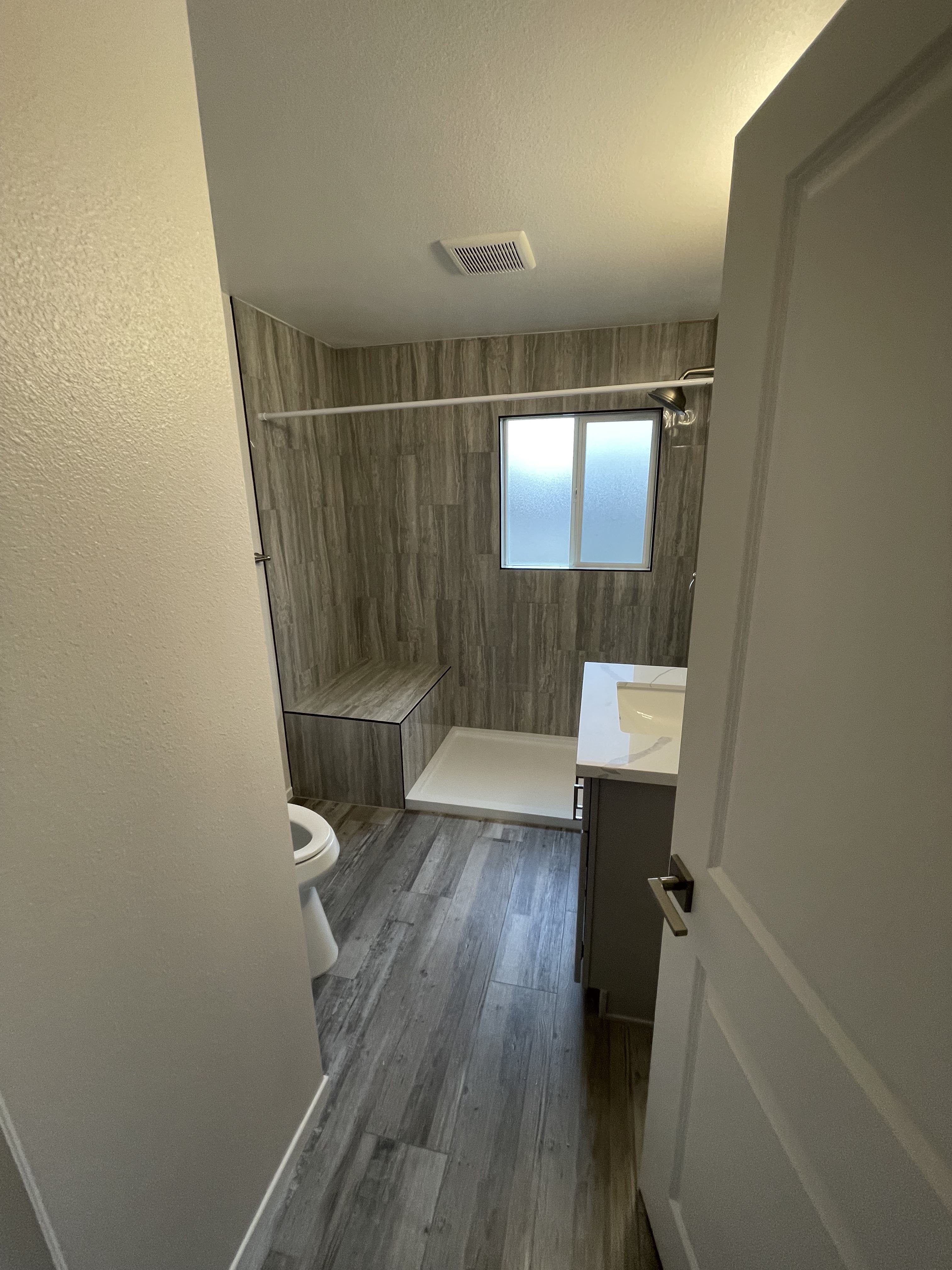 After Interior Bathroom, Repaired Walls, Floors, Tiles, Shower, Electrical, Doors, etc. Photo