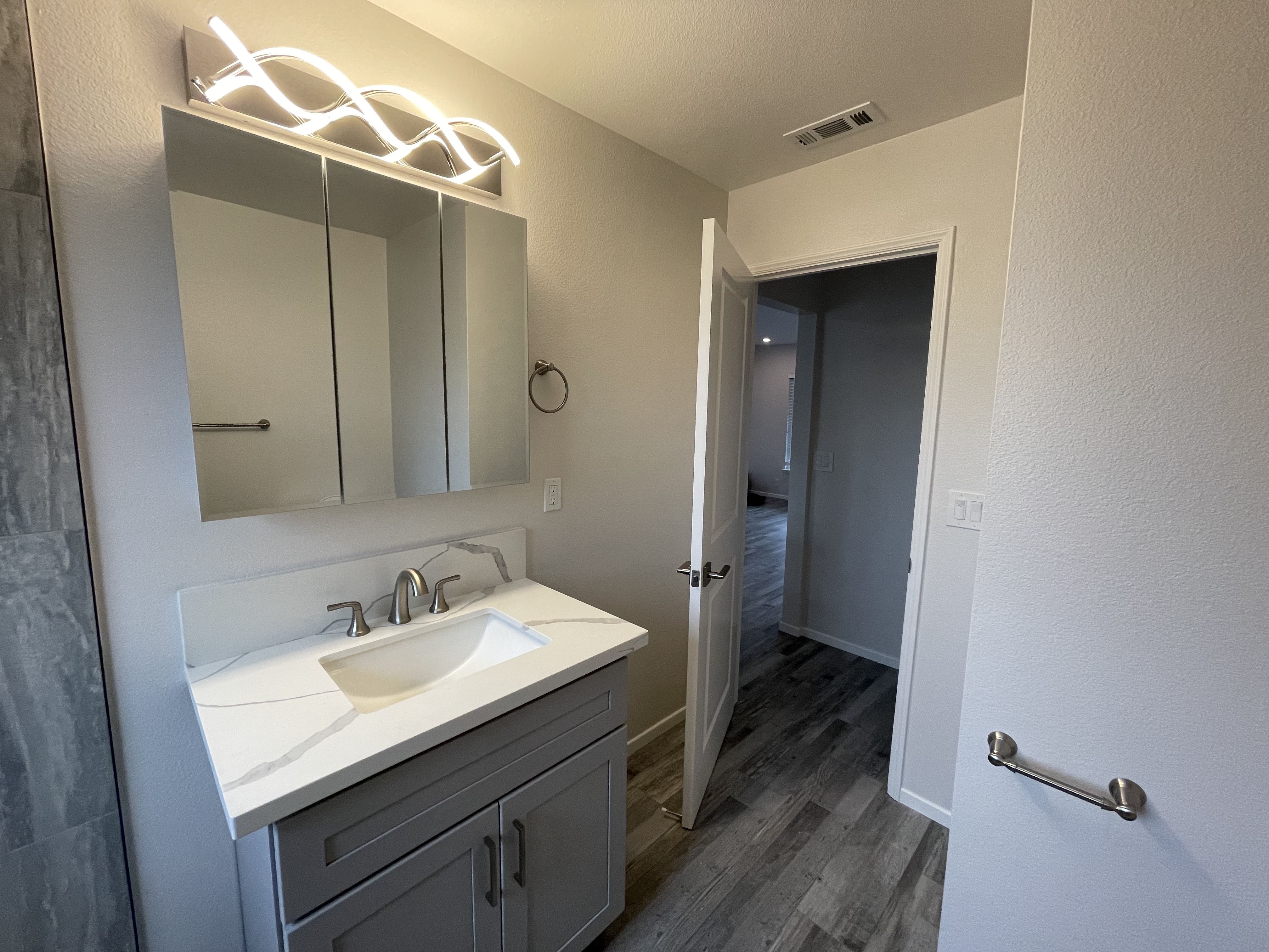 After Interior Bathroom, Repaired Walls, Floors, Tiles, Shower, Electrical, Doors, etc. Photo