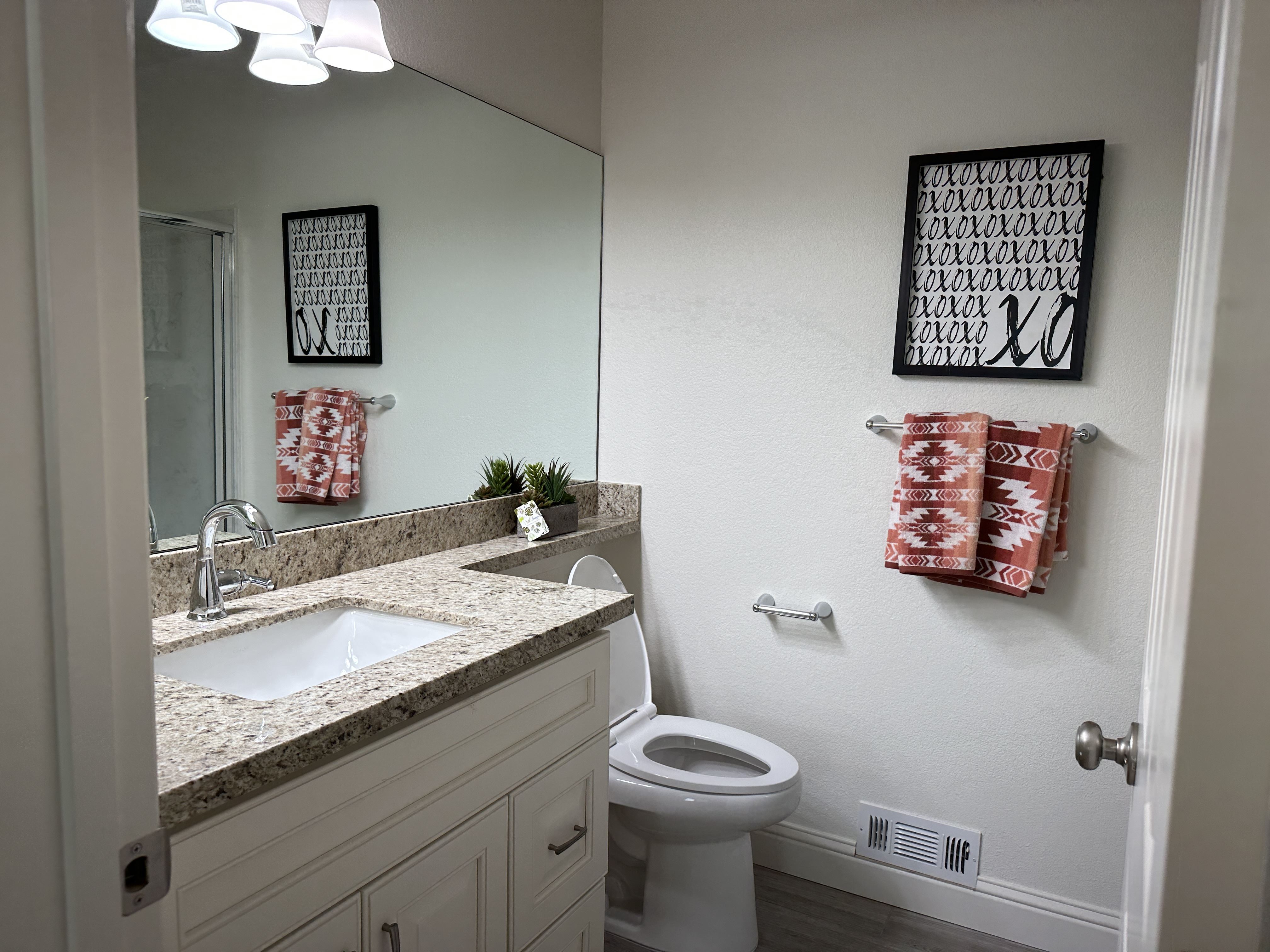 After: The gleaming and refreshed bathroom after restoration. Photo